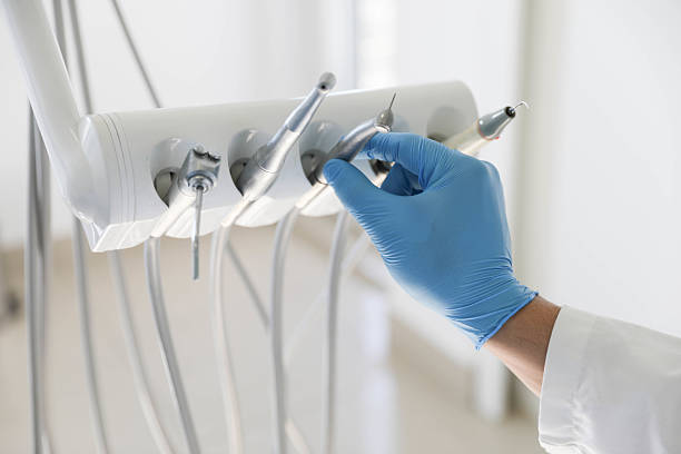 Professional Tooth Extraction technician working in Parker City, IN